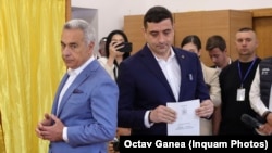 კალინ ჯორჯესკუმ და ჯორჯე სიმიონმა [მარჯვნივ] მონაწილეობა მიიღეს რუმინეთში მიმდინარე საპრეზიდენტო არჩევნების პირველ ტურში. 