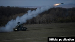 Armenia - An Armenian air-defense system fires a surface-to-air missile during an exercise, 13Nov2014.