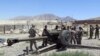 U.S. military advisers from the 1st Security Force Assistance Brigade work with Afghan soldiers at an artillery position on an Afghan National Army base in Maidan Wardak Province on August 6.