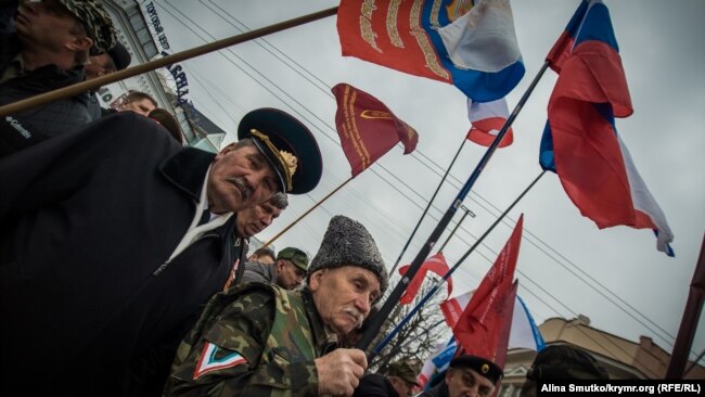 «Крымские казаки» и ветераны войны в Афганистане на митинге по случаю годовщины «референдума» в Крыму, 16 марта 2017 года. Архивное фото