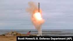 An August 18 photo provided by the U.S. Defense Department shows the launch of a conventionally configured ground-launched cruise missile on San Nicolas Island off the coast of California. 