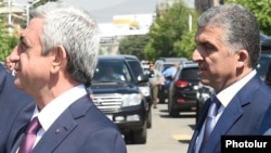 Armenia - President Serzh Sarkisian (L) and his chief bodyguard Vachagan Ghazarian, 11 July 2015.