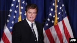 U.S. -- Paul Manafort, advisor to Republican presidential candidate Donald Trump's campaign, checks the teleprompters before Trump's speech at the Mayflower Hotel in Washington, April 27, 2016