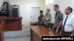 Nagorno-Karabakh - Manvel Hazroyan (second from right) is sentenced to life in prison for killing four fellow soldiers and wounding three others in November 2010, 03Aug2011.