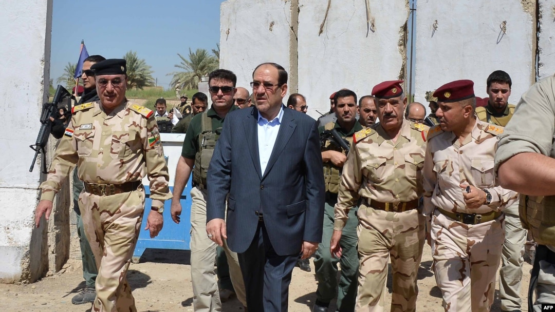Iraqi Prime Minister Nuri al-Maliki tours military posts on the outskirts of Baghdad on August 6. Can Maliki rise above sectarian divisions to finally unite Iraq?