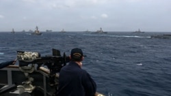 A US sailor aboard the guided-missile destroyer USS Frank E. Petersen Jr. is shown in photo released by US Central Command.  