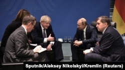 Întâlnire Vladimir Putin-Boris Johnson laBerlin, 19 ianuarie 2020.