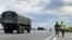 Kazakhstan – Kazakhstan – military police and a military truck at highway from Taraz to Almaty. Baizak district, Zhambul region. 27 August 2021
