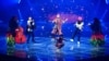  Украинская группа Kalush Orchestra во время выступления с песней Stefania в финале песенного конкурса Евровидение-2022. Турин, Италия, 14 мая 2022 года