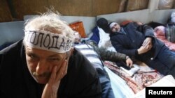 Scores of Chornobyl veterans stages a sit-in protests in Donetsk late last year. 