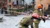 Спасатели у разрушенного взрывом дома в Иваново