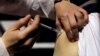 افغانستان کې امریکايي پوځیانو ته د کرونا ضد واکسین تطبیق پيل شو