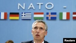 Jens Stoltenberg gjatë fjalimit të tij në hapje të takimit urgjent të NATO-s në Bruksel