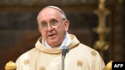 Pope Francis leads a mass at the Sistine Chapel in the Vatican on March 14.