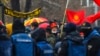 People demonstrate in front of the parliament building in Skopje on January 9. They were protesting a plan to rename the country as North Macedonia. The compromise with Greece, which took effect a month later, was seen as a key to the country&#39;s ambition to join NATO and the European Union. (EPA-EFE/Georgi Licovski)