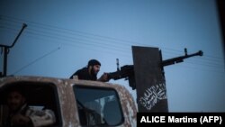Un membru al opoziției islamiste siriene Ahrar al-Sham, care și-a asumat doborârea avionului