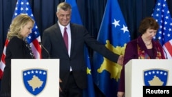 U.S. Secretary of State Hillary Clinton with Kosovar Prime Minister Hashim Thaci and EU foreign policy chief Catherine Ashton (left to right) after a news conference in Pristina on October 31.