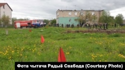 Rescue workers at the scene of the crash on the outskirts of Baranavichy on May 19.