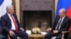 Russian President Vladimir Putin (right) meets with his Cuban counterpart Miguel Diaz-Canel in Moscow on October 29. (file photo)