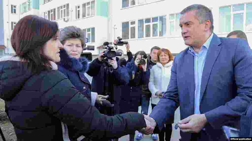 Ukraine, Crimea - Aksyonov Sergey handed over the keys to the apartment, 17Dec2015