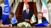 Iranian Foreign Minister Abbas Araqchi (right) and Director-General of the International Atomic Energy Agency Rafael Grossi (left) sign an agreement to open the way for resuming cooperation, at Tahrir Palace in Cairo, on September 9.