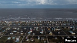 Vedere din dronă asupra urmărilor uraganului Beryl la Surfside Beach, Texas, la 8 iulie 2024. 