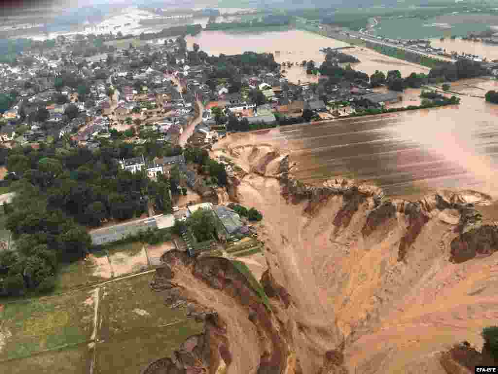 A handout photo made available by the Rhein-Erft authorities shows the area after heavy rains had triggered flooding in Erftstadt-Blessem, Germany, July 16, 2021.&nbsp;