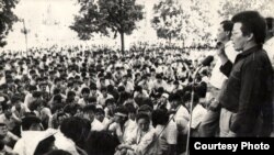 Topchubek Turgunaliev (right) and Jypar Jeksheev, two of the five co-chairmen of the Kyrgyzstan Democratic Movement, address a protest rally demanding democratic reforms in central Bishkek on June 5, 1990.
