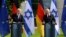 German Chancellor Olaf Scholz (right) made his remarks while speaking after a meeting in Berlin with Israeli Prime Minister Yair Lapid (left) on September 12.