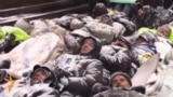 Activists Stage 'Lie-In' Amid Mass Protests In Kyiv