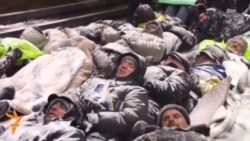 Activists Stage 'Lie-In' Amid Mass Protests In Kyiv