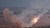 Турецкая армия обстреливает ракетами сирийский город Рас-аль-Айн со своей территории. 15 октября 2019 года