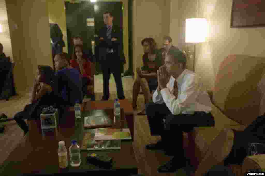 U.S. President-elect Barack Obama and his family watch the results come in on election night in Chicago on November 5. - obama10