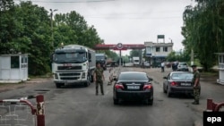 Russian soldiers man a border station near Benderi, in Moldova's breakaway Transdniaster, in this 2013 photograph.