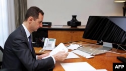 Syria -- President Bashar al-Assad in his office in the capital Damascus, 13Jun2013