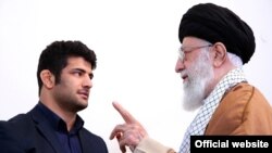 Ali Khamenei meets Iranian wrestler, Alireza Karimi, December 10, 2017.