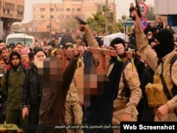 The Islamic State said it also crucified two men for “banditry.”