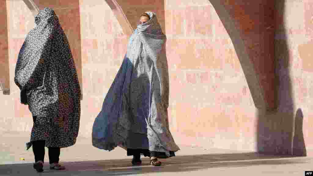 Azerbaijani women walk to prayers at the Pink Mosque in Nardaran near Baku on July 30. (AFP/Vano Shlamov)