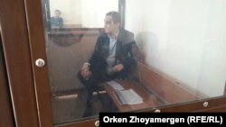 Nurbek Qushaqbaev in an Astana courtroom on April 3