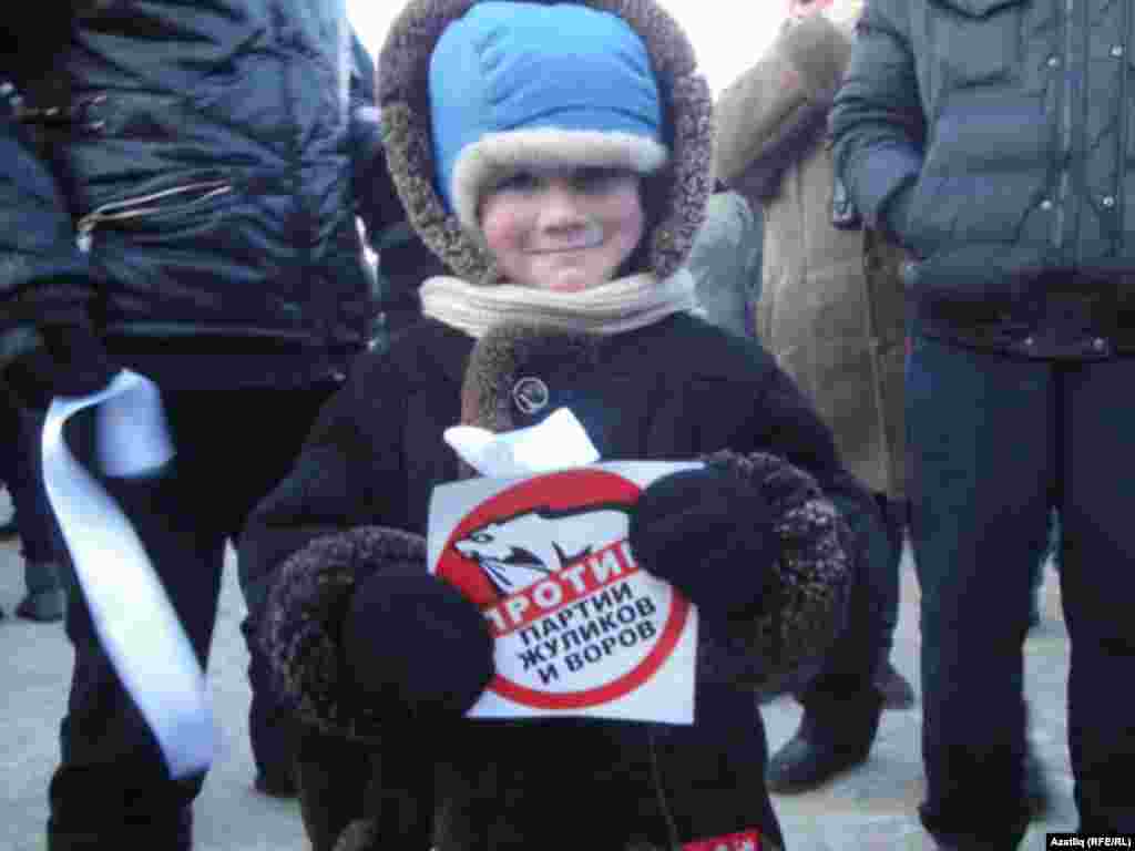 &quot;Against the party of swindlers and thieves&quot; is a common reference to the ruling United Russia party, with its bear logo.