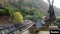 Iraq -- A view of a destroyed bridge after Turkish warplanes backed by heavy artillery struck Kurdish guerrilla targets in Dahuk Province, 20Aug2011