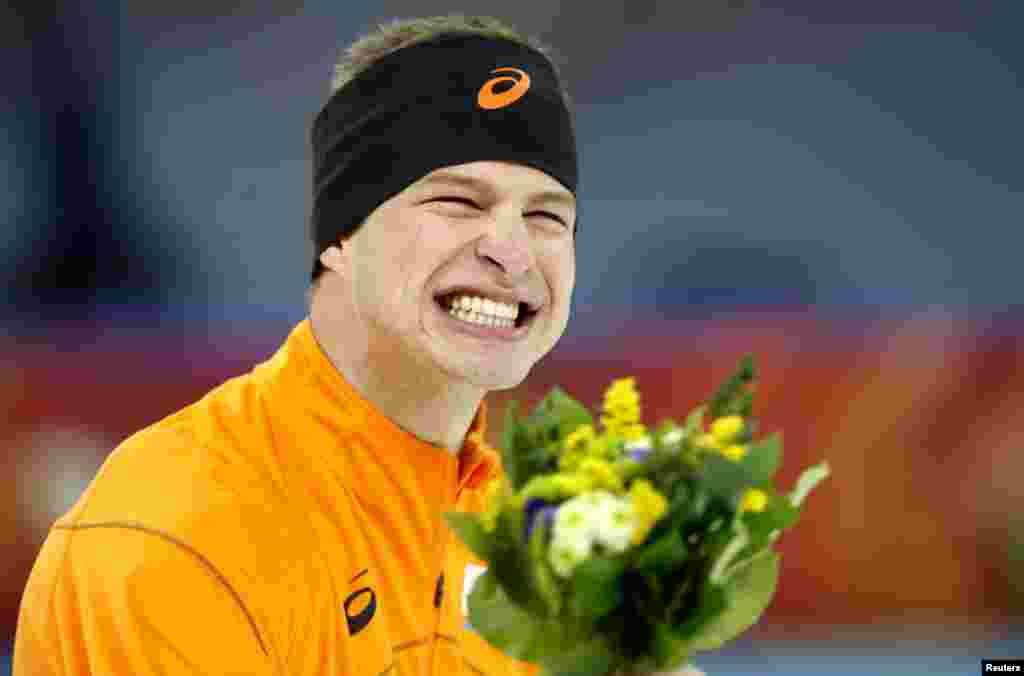 Sven Kramer of the Netherlands shows his delight after winning and setting an Olympic record time in the men&#39;s 5,000 meters speed skating race.&nbsp;
