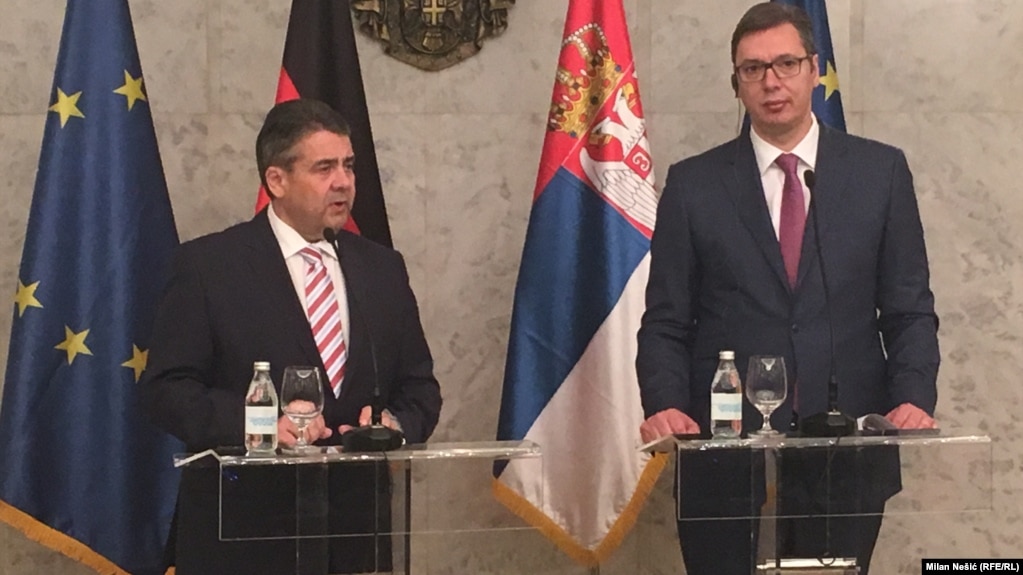 German Foreign Minister Sigmar Gabriel (left) and President-elect and Prime Minister of Serbia Aleksandar Vucic speak to the press in Belgrade on April 12.