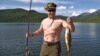 Vladimir Putin was photographed while fishing on a recent break from his presidential duties.