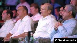 Russia - The presidents of Russia, Armenia and Azerbaijan watch a wrestling competition in Sochi, 09Aug2014.