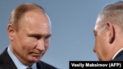 Russian President Vladimir Putin (left) and Israeli Prime Minister Benjamin Netanyahu (file photo)