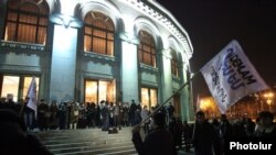 Armenia - Spectators leave the National Opera Theater in Yerevan following the announcement of a strike by its singers and musicians, 10Feb2014.