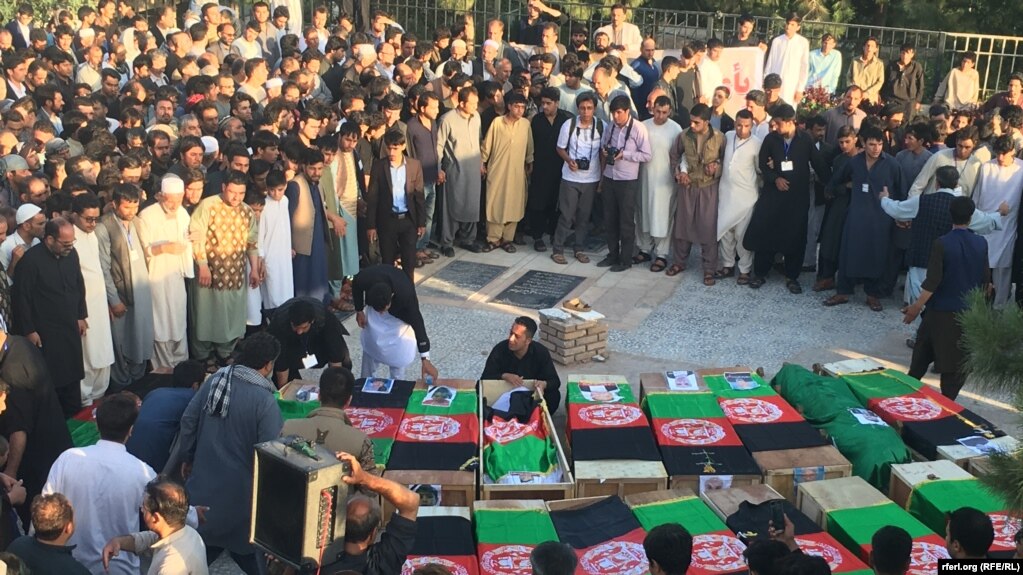 Coffins of those killed in a bomb attack on a Shi'ite mosque in Herat.