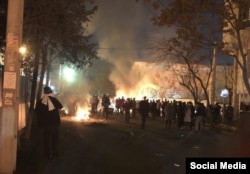 Iranian security forces clash with members of the Gonabadi Sufi community in Tehran on February 19.