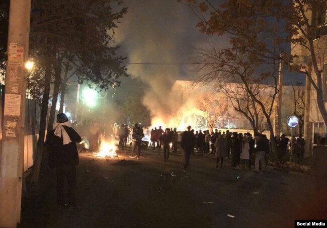 Iranian security forces clash with members of the Gonabadi Sufi community in Tehran on February 19.